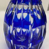 Midnight blue carafe with multiple reflections