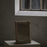 Wall mirror in tramp art style, hand-carved with a painted white frame, early 1900s.