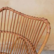 Vintage rattan chair by Louis Sognot