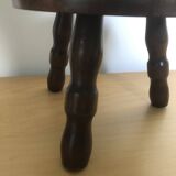 Low tripod stool in solid wood