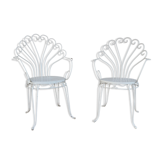 Chaises de couples dans le dos de paon de fer, le cru