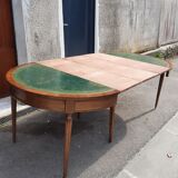 Round table with Louis XVI style extensions