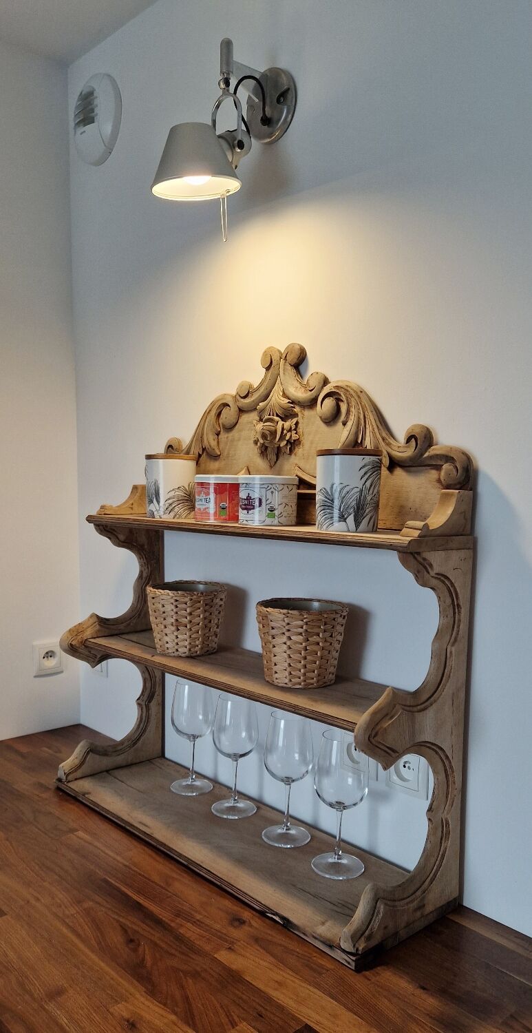 Old wall shelf carved in walnut