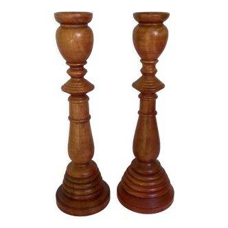 Pair of candle holders in stained wood