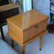 Modernist bedside table from the 1950s with compass legs.