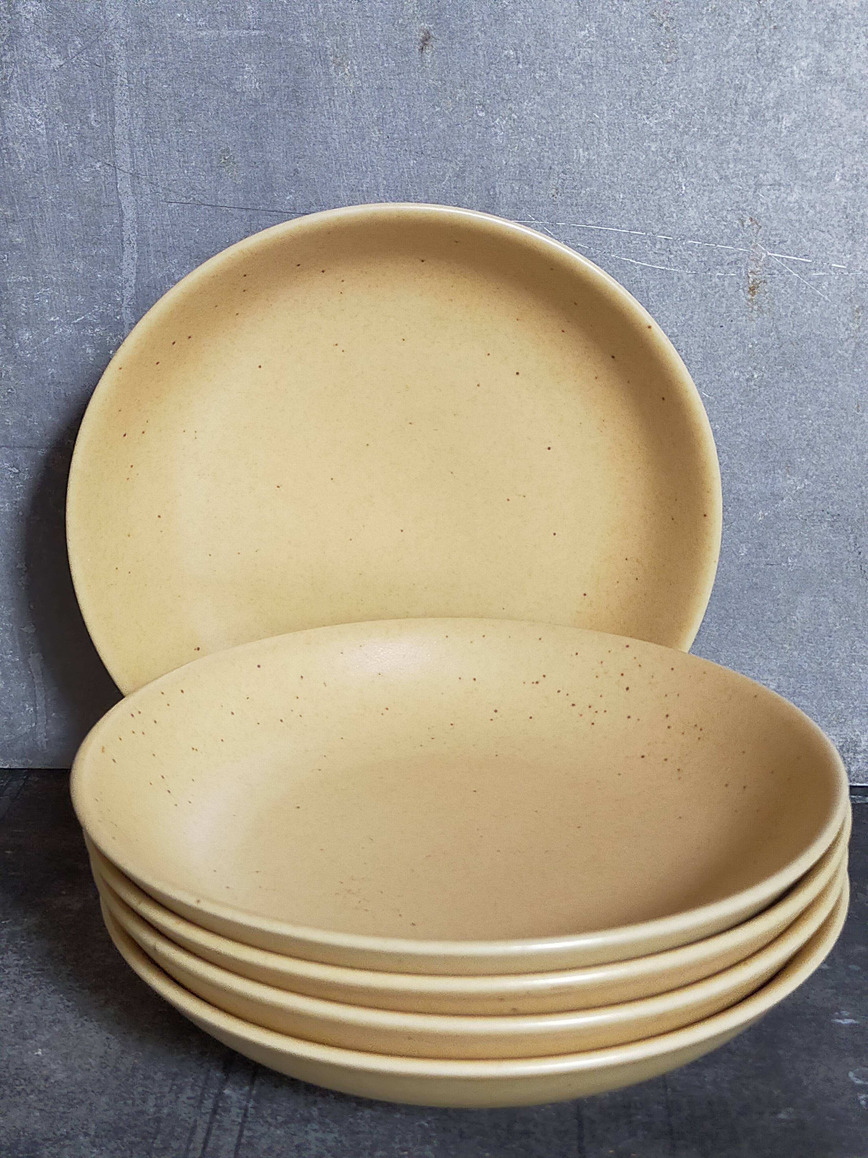 Five vintage natural stoneware soup plates