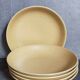 Five vintage natural stoneware soup plates