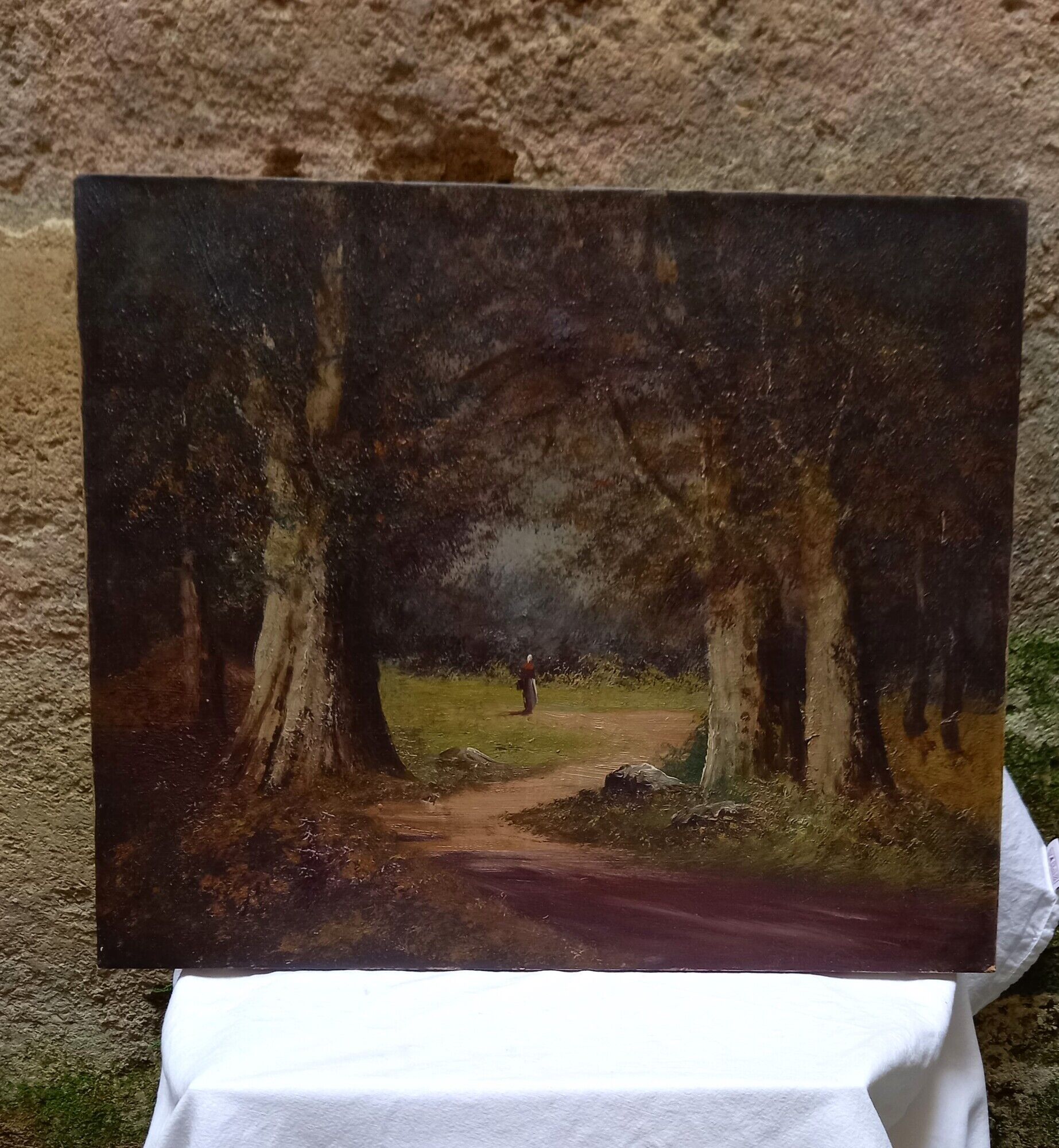 Old painting, oil on canvas representing a forest scene, early twentieth century