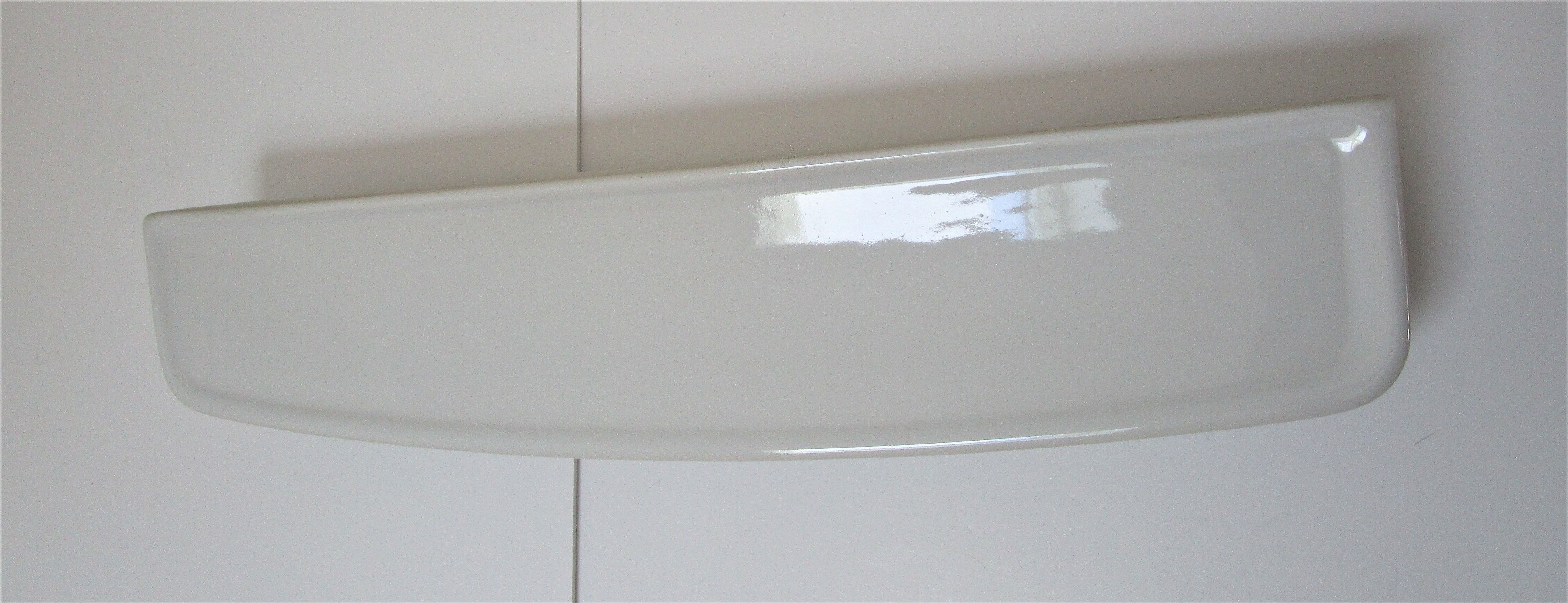 Vintage white enamelled ceramic wall shelf