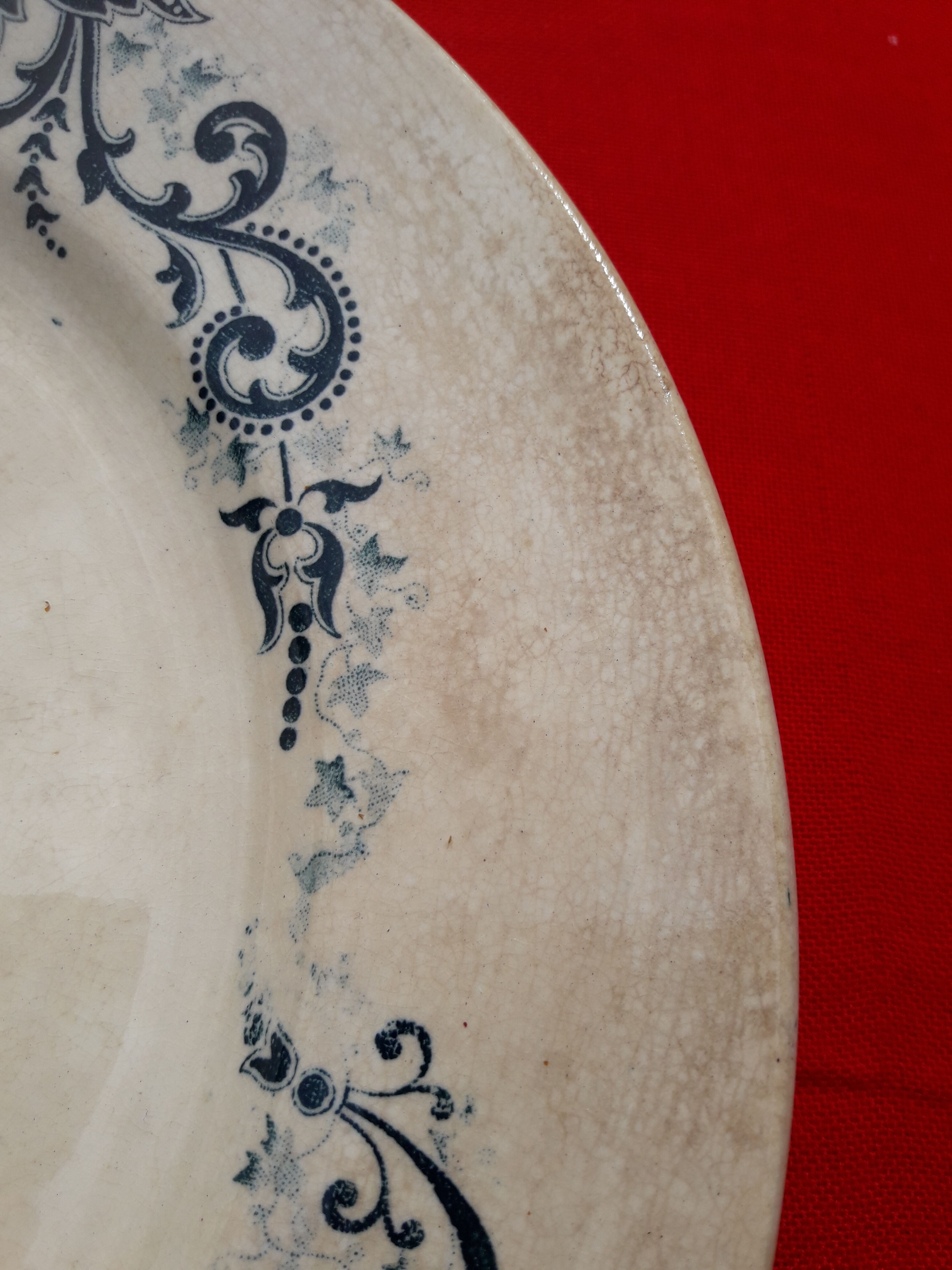 Old dish decorated with blue frieze diam 28 cm