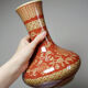 20th century Chinese vase, hand-painted ceramic in an unusual red hue.