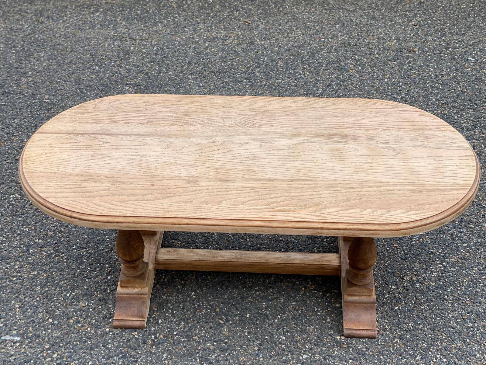 Renovated oval farmhouse or monstera coffee table in raw solid wood