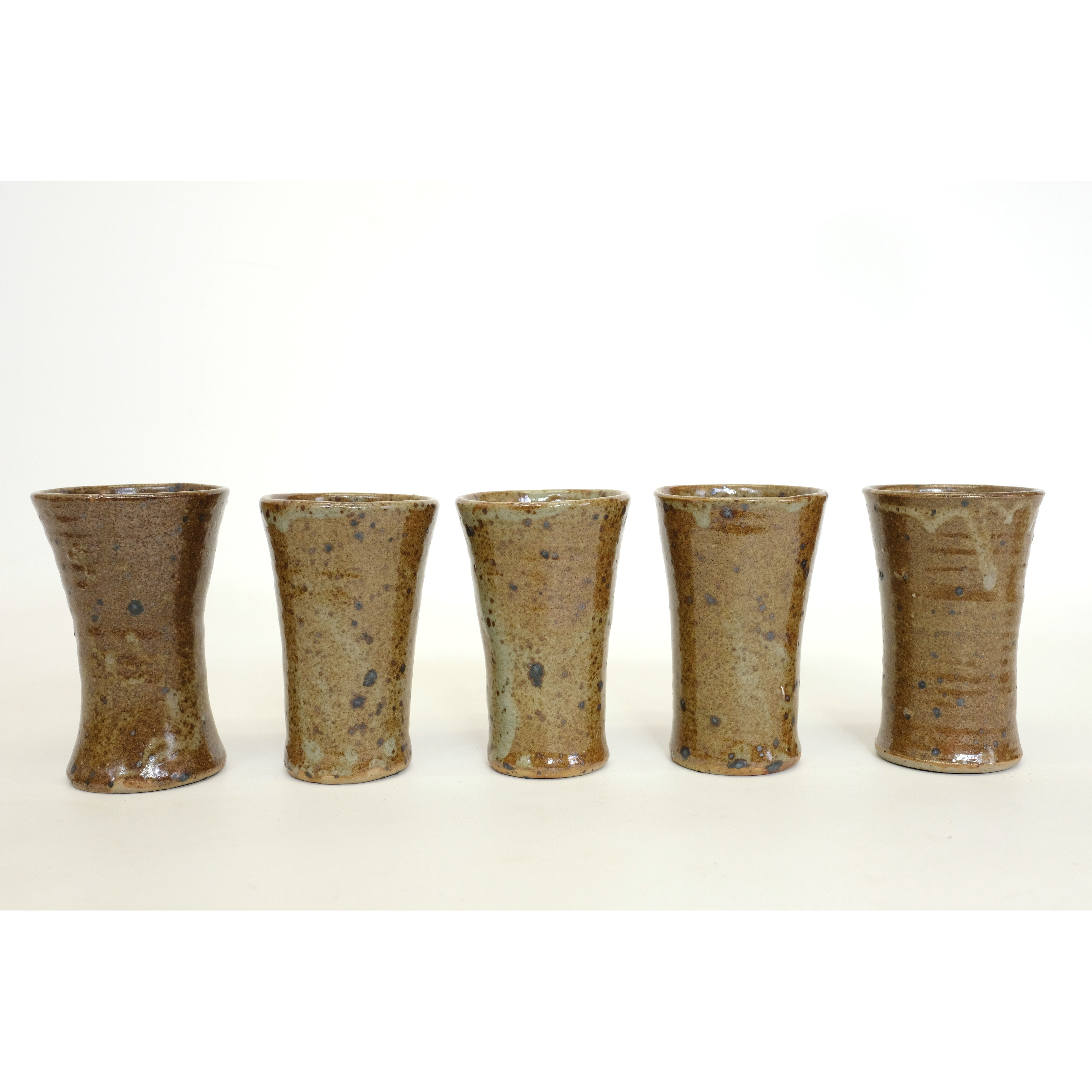 Sandstone teapot from La Borne and 5 cups signed Tiffoche, 1970s.