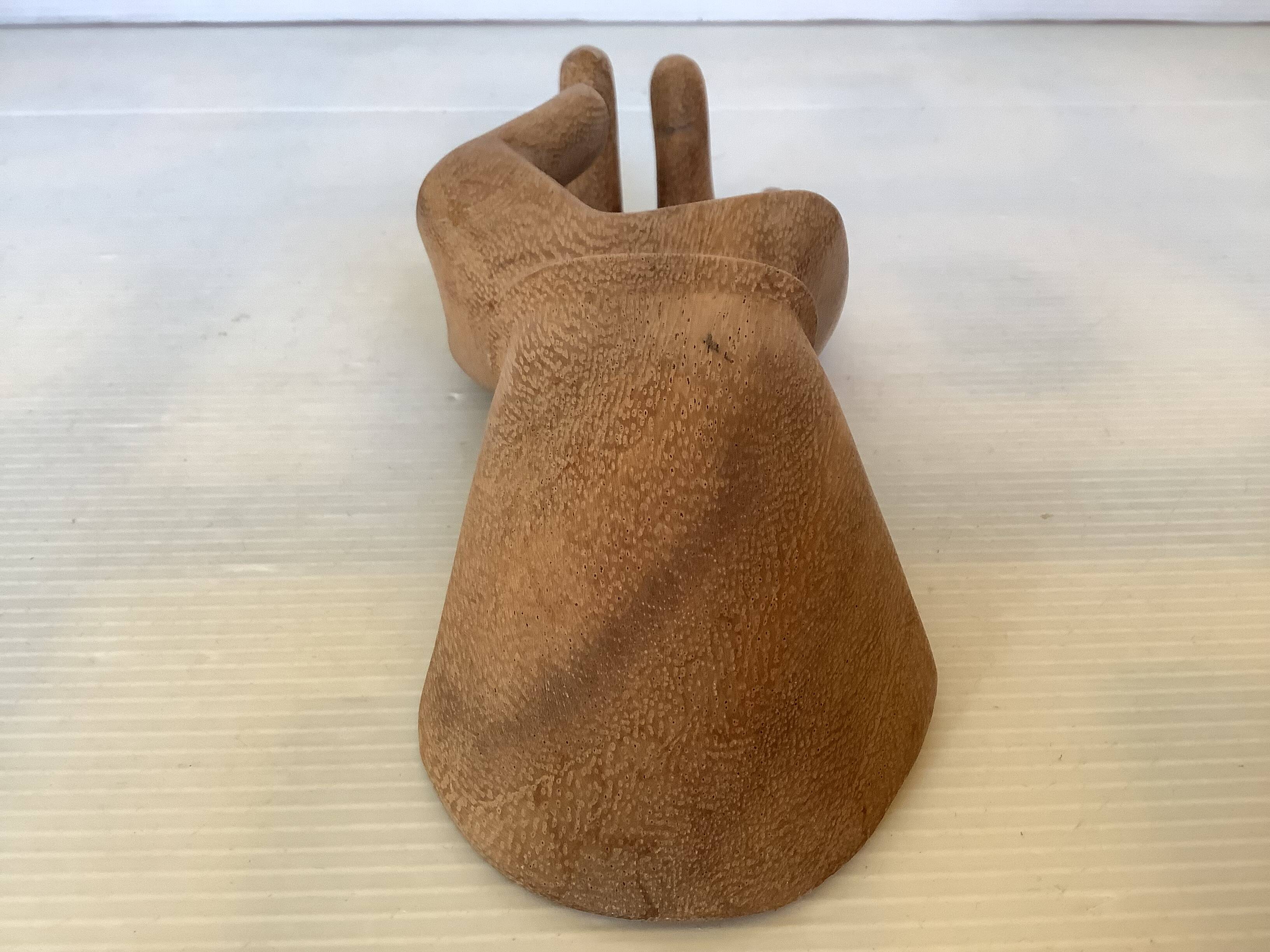 Wooden hand ring sizer pocket emptier