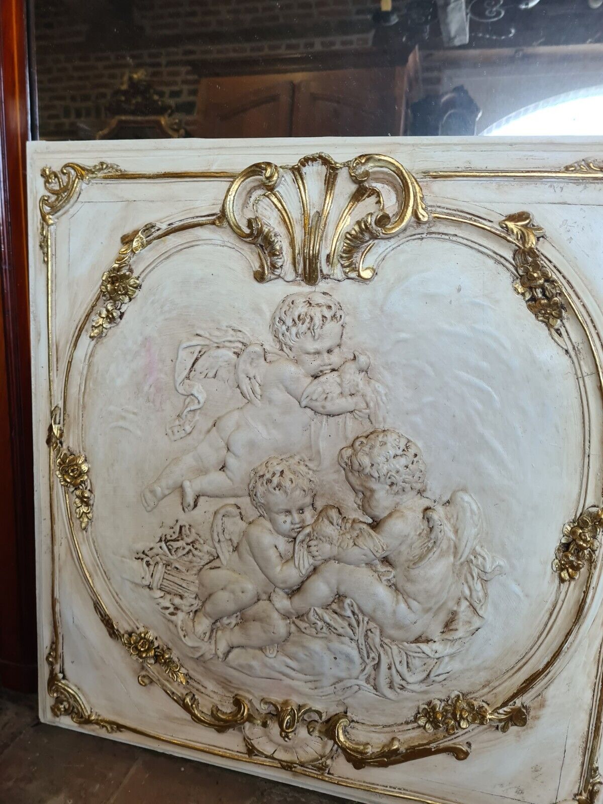 Decorative panel with stucco angels