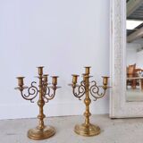 Pair of four-light candle holders in gilded brass