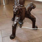 Antique floor lamp with lion motif