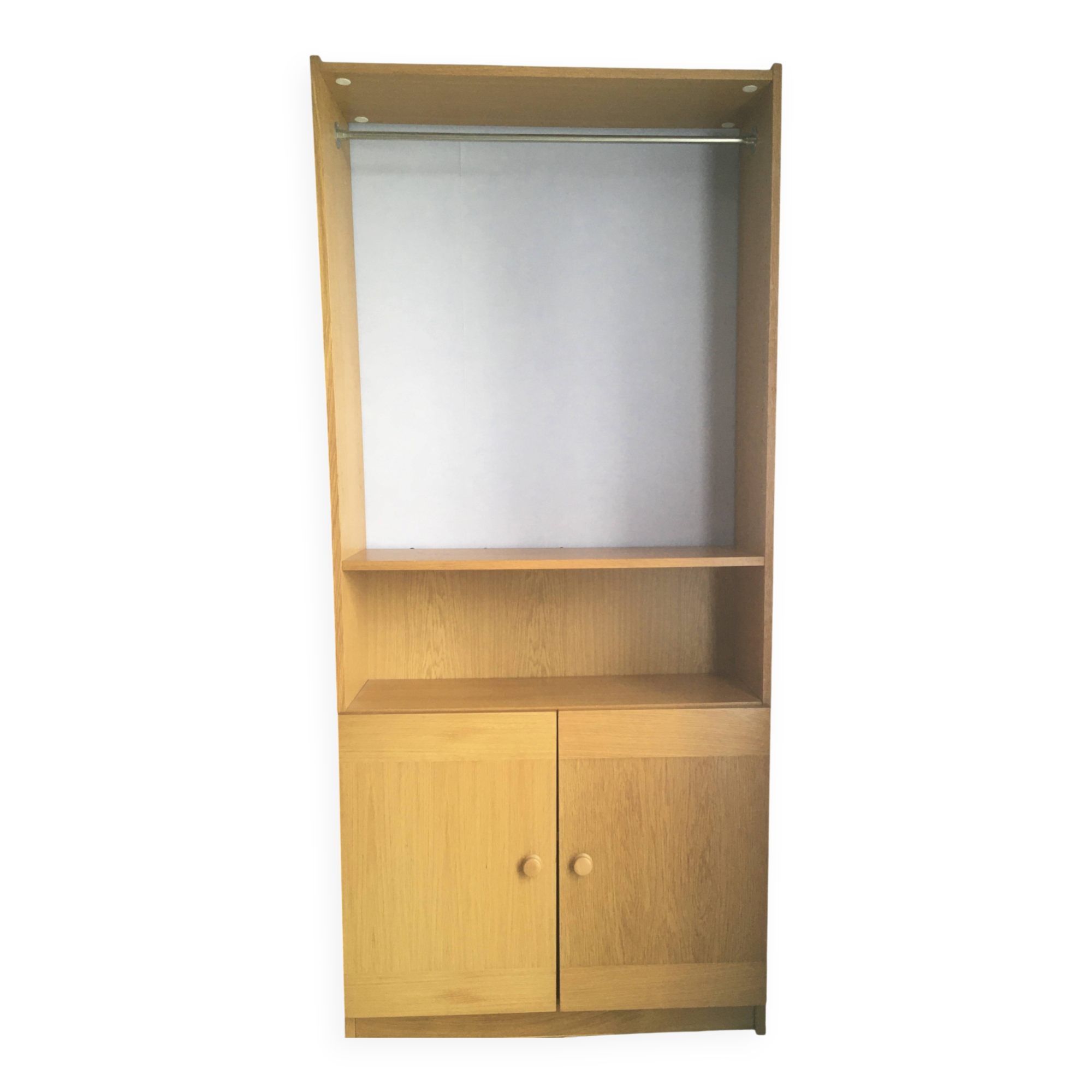 Dressing vintage Scandinavian style in light wood with wardrobe and cupboard.