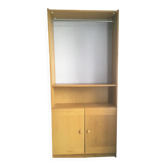 Dressing vintage Scandinavian style in light wood with wardrobe and cupboard.