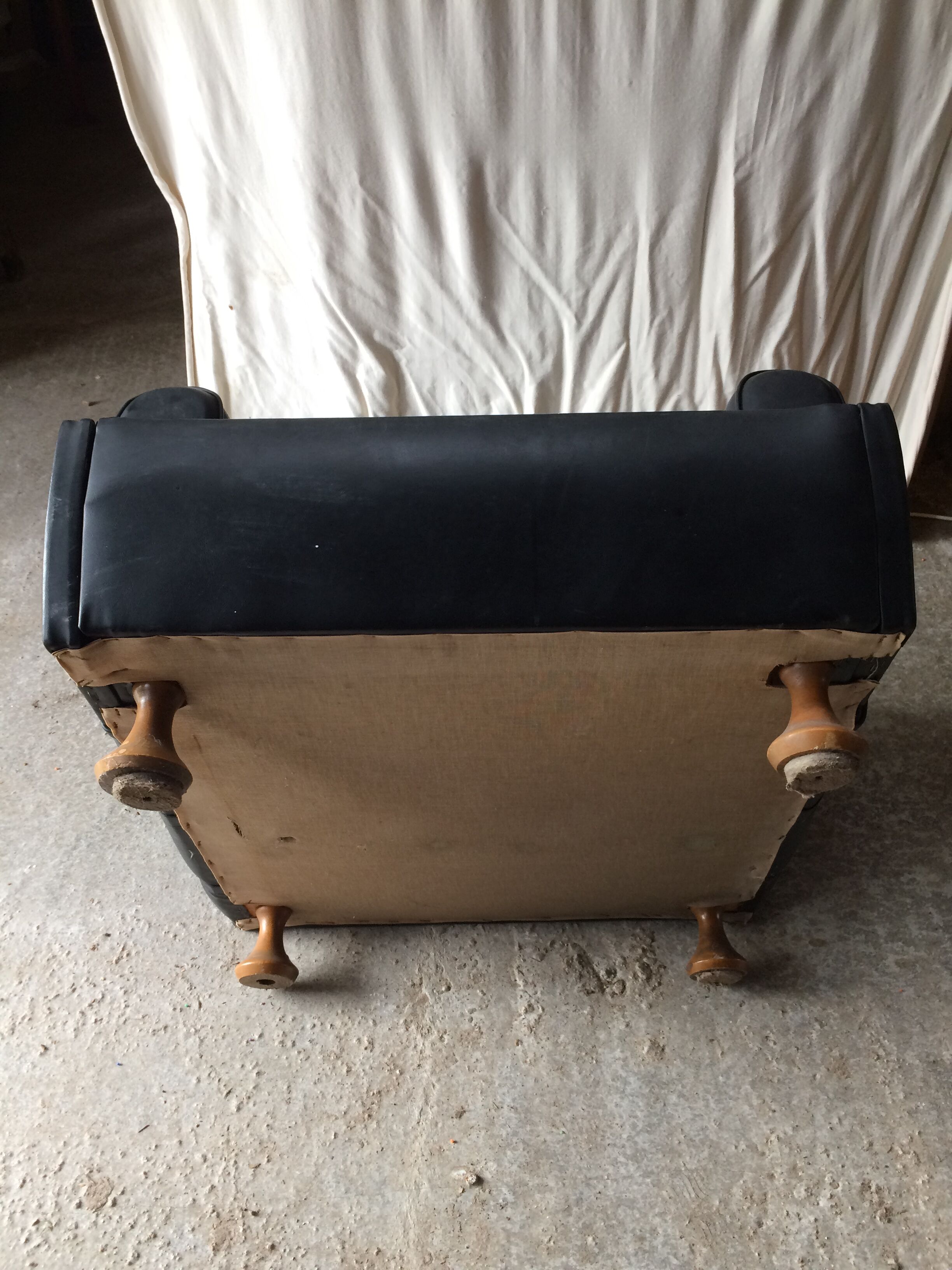 Former black leather chair