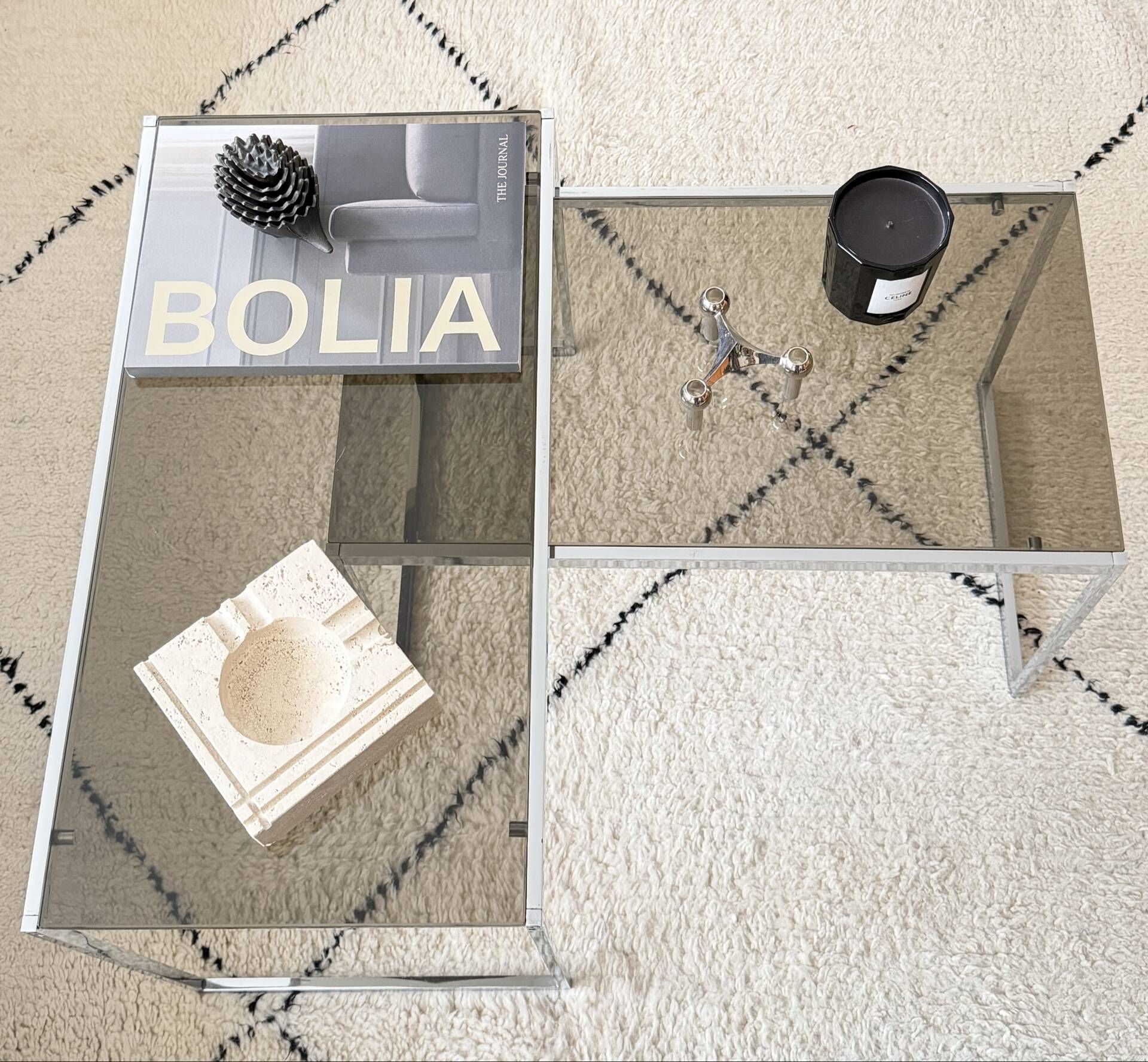 Set of 2 vintage nesting coffee tables in chrome metal and smoked glass.