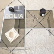 Set of 2 vintage nesting coffee tables in chrome metal and smoked glass.