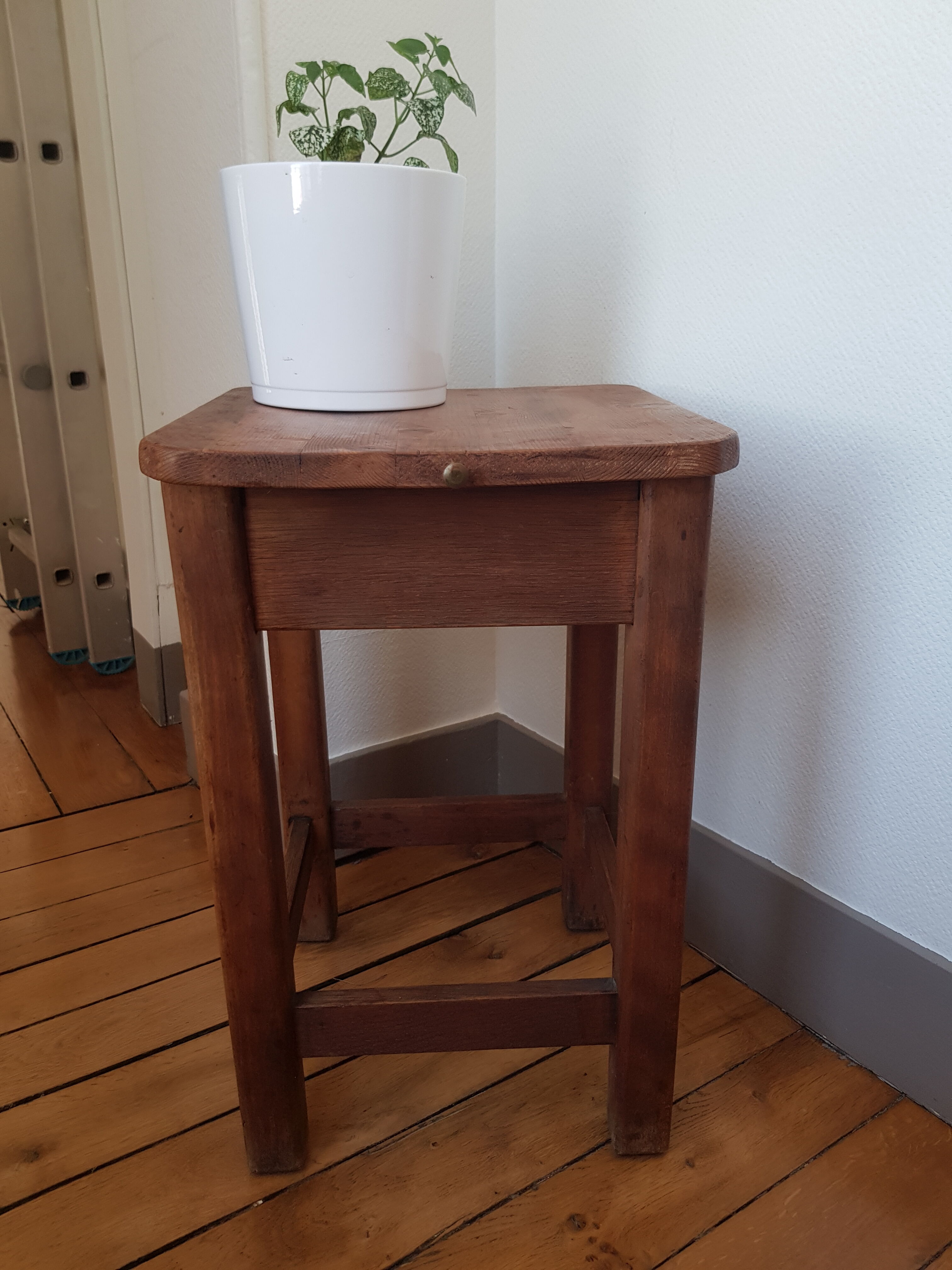 Wooden stool with chest