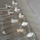 14 antique glass knife rests / ducks