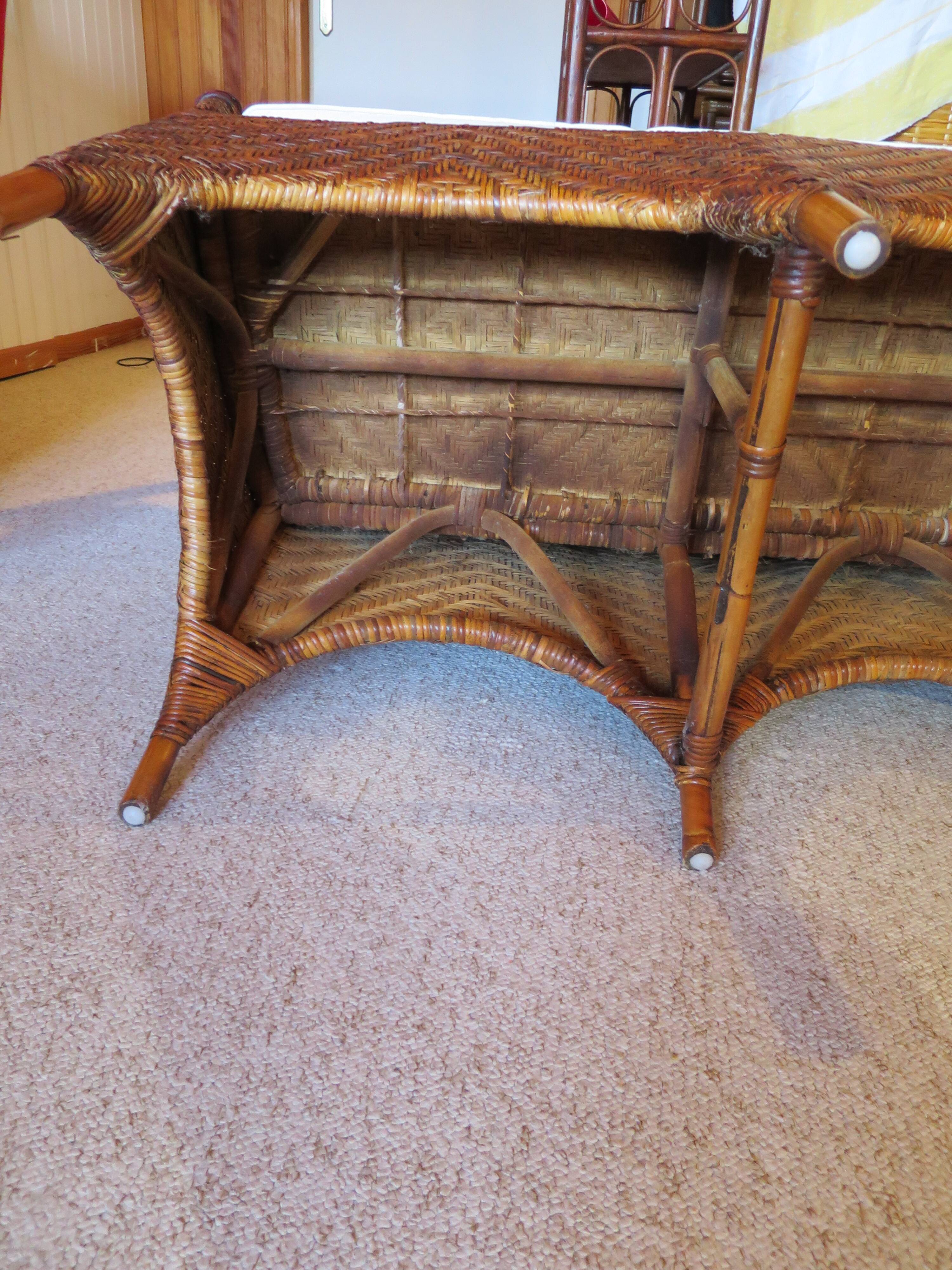 Two-seater banquette in woven rattan, wood and bamboo, 1980s.
