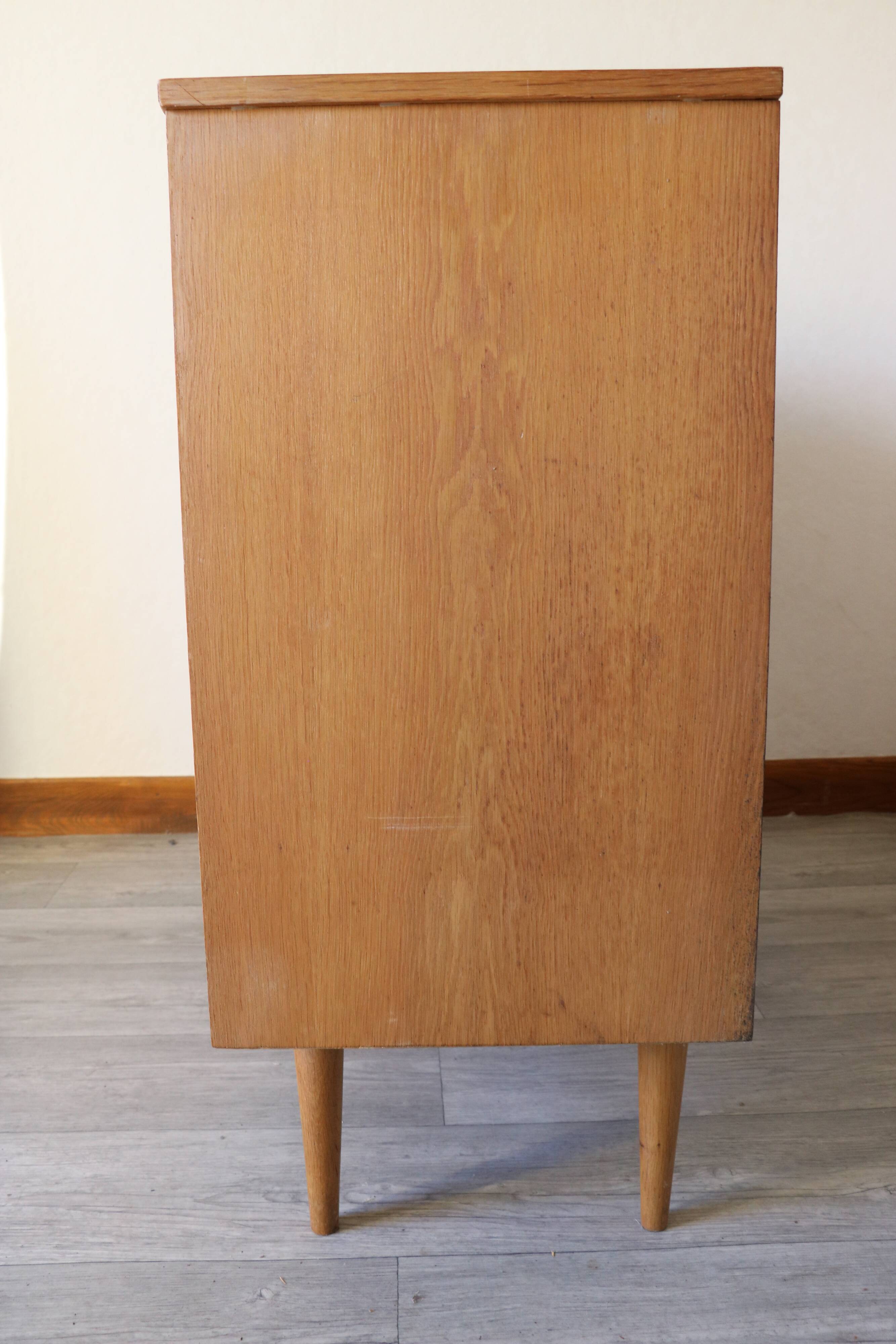 Vintage chest of drawers with compass feet