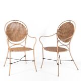 Pair of rattan and iron armchairs