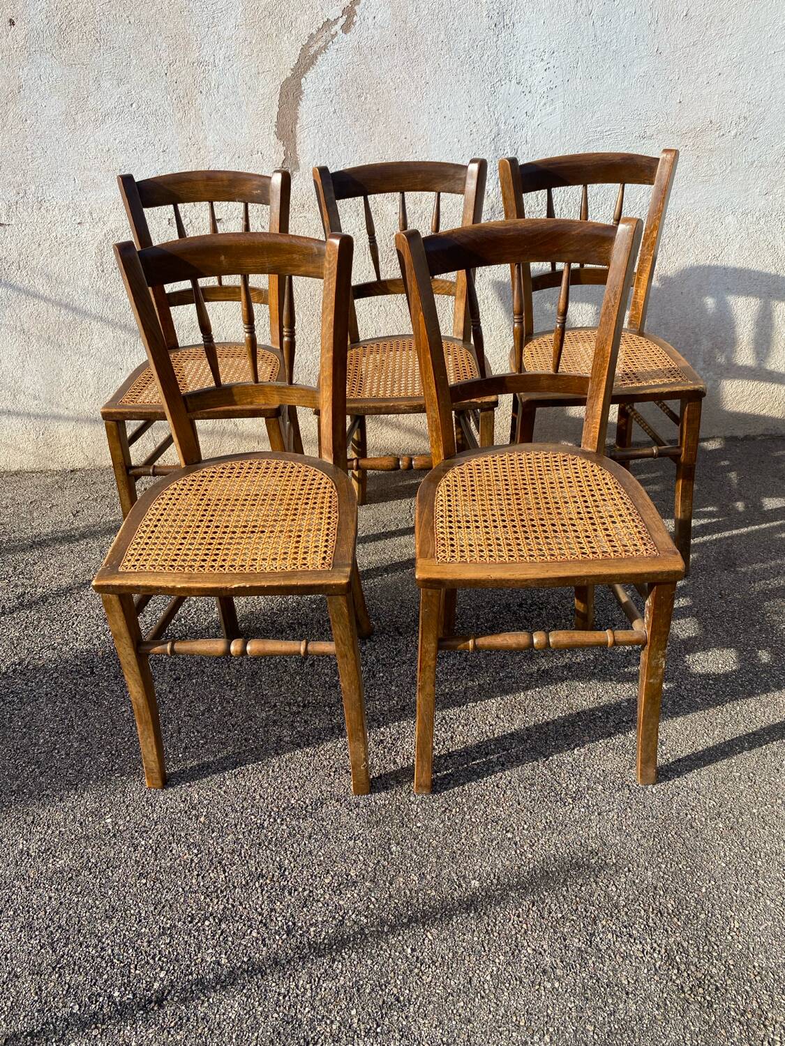 Set of 5 caned bistro chairs