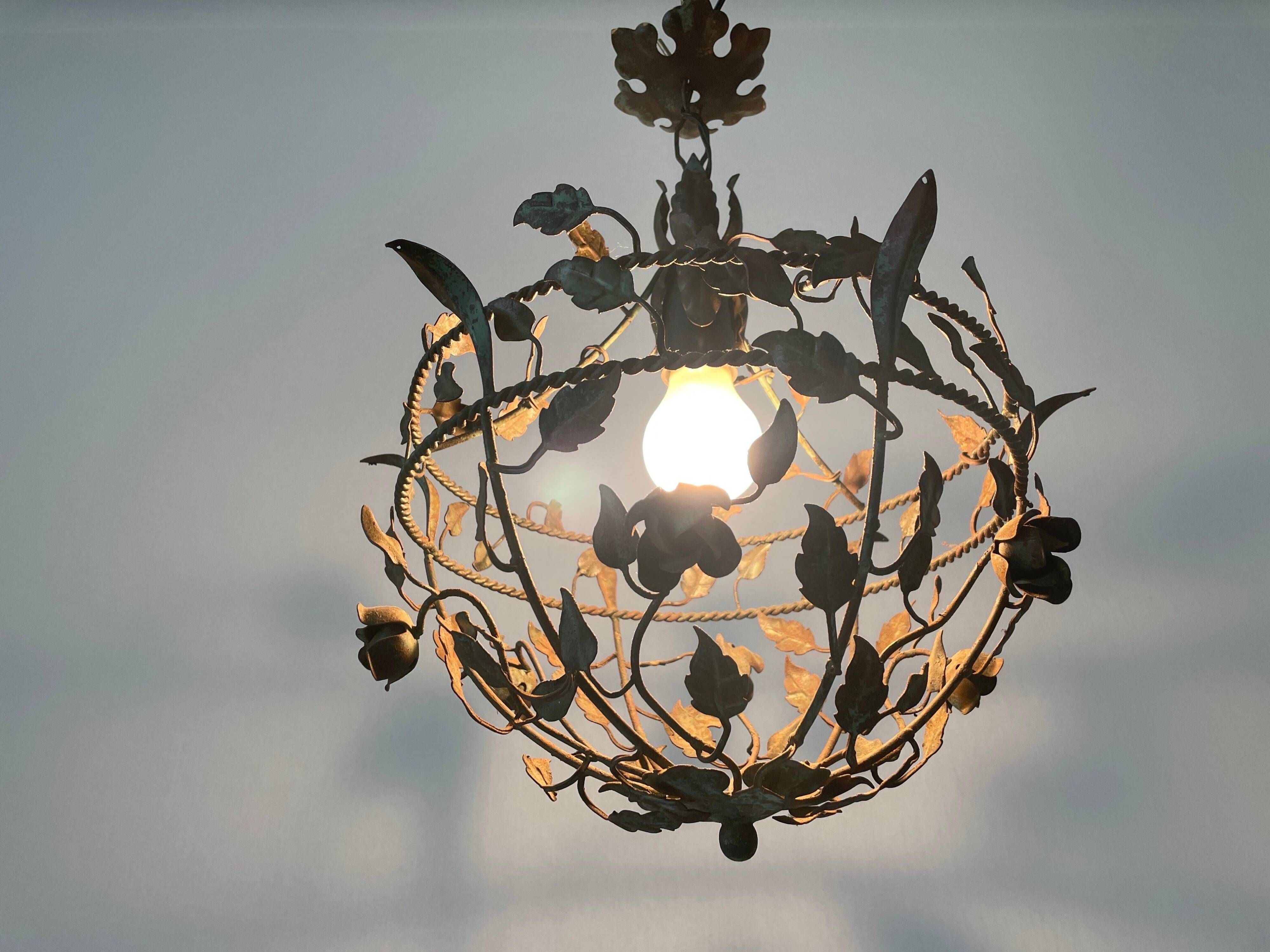 Patinated metal ceiling light with a floral and leaf pattern, 1950s, Italy.