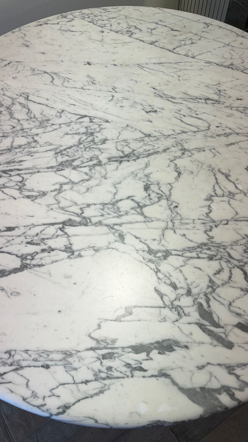 Marble and wicker dining table