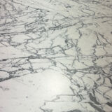 Marble and wicker dining table