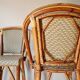 Pair of vintage Gatti bar stools in two-tone rattan and caning.