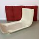 Vintage red shell lounge chairs from the 70s mid-century retro.