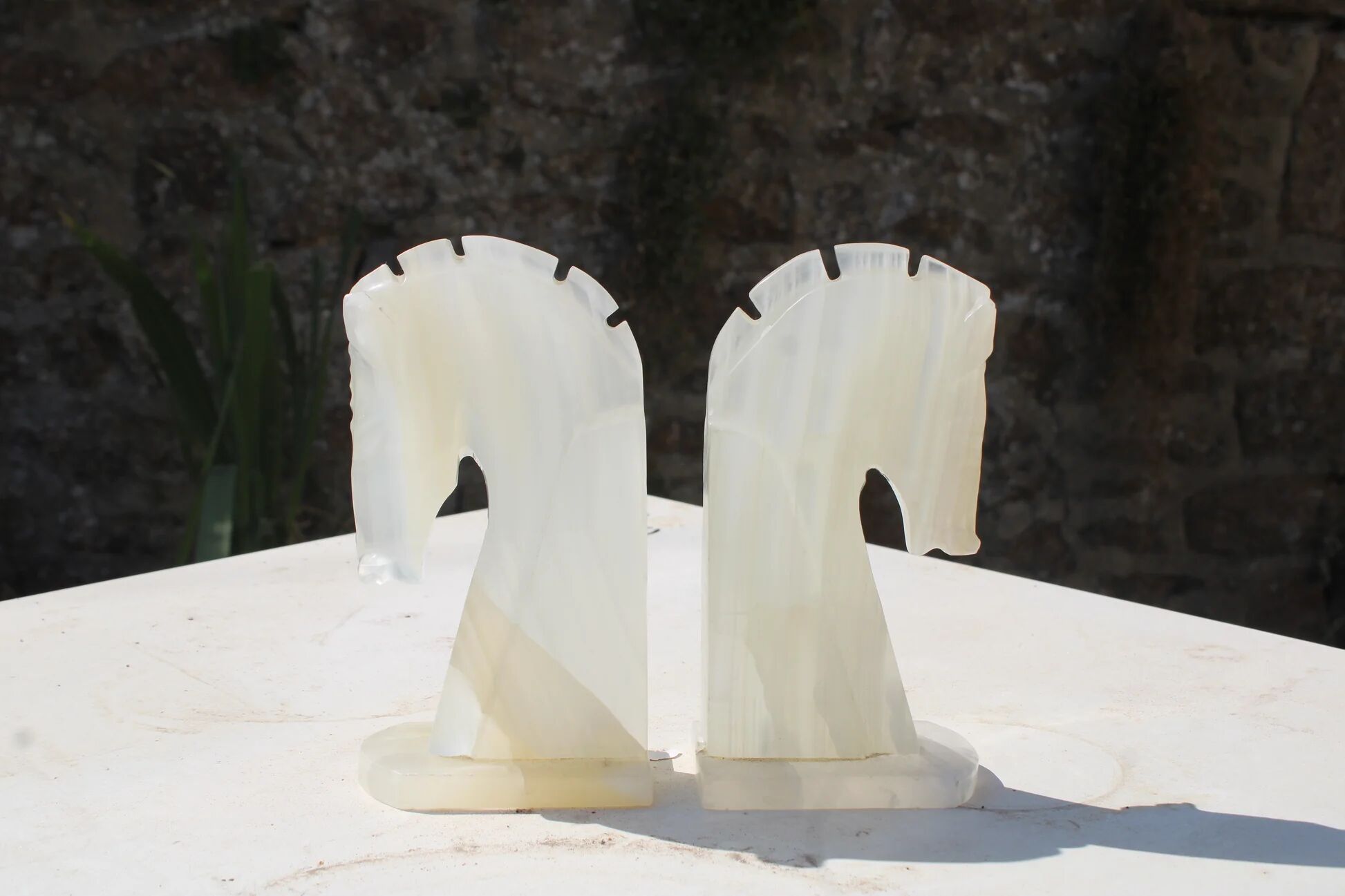 Vintage white onyx bookends – Horse heads