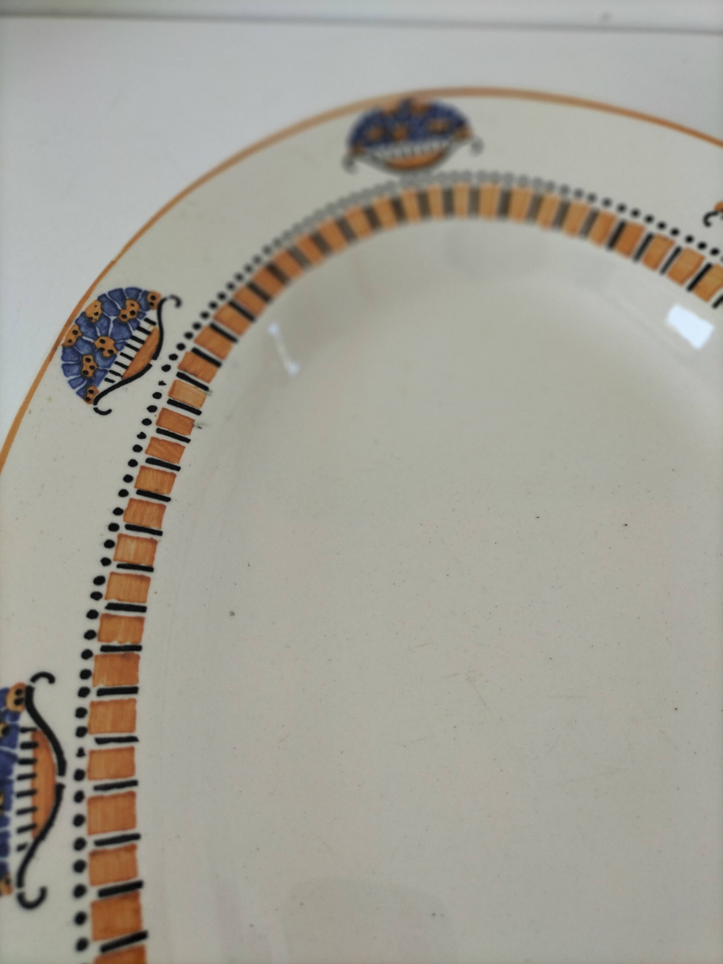 Oval Art Deco plate from Longwy pottery.