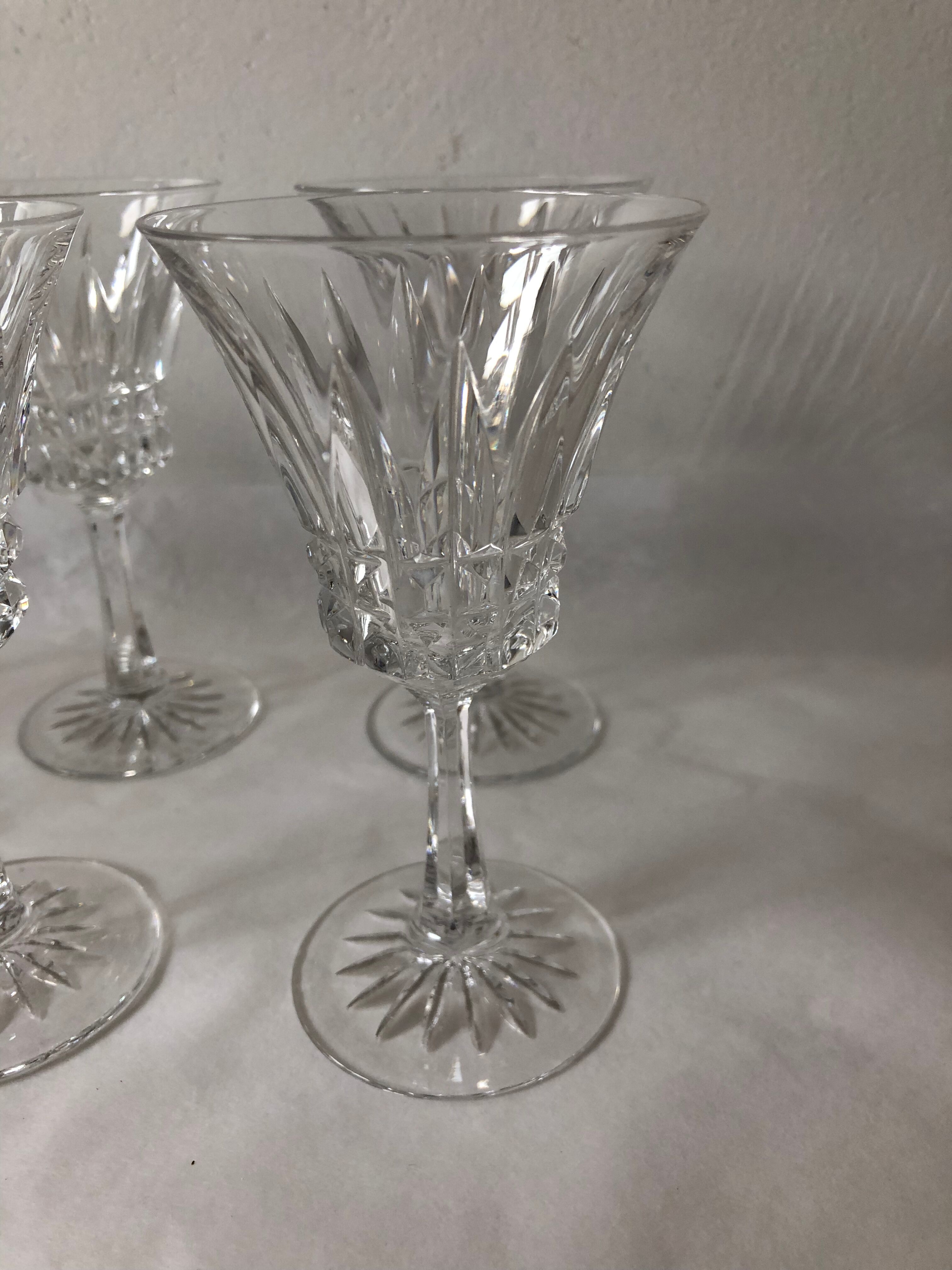Eight Baccarat crystal wine glasses