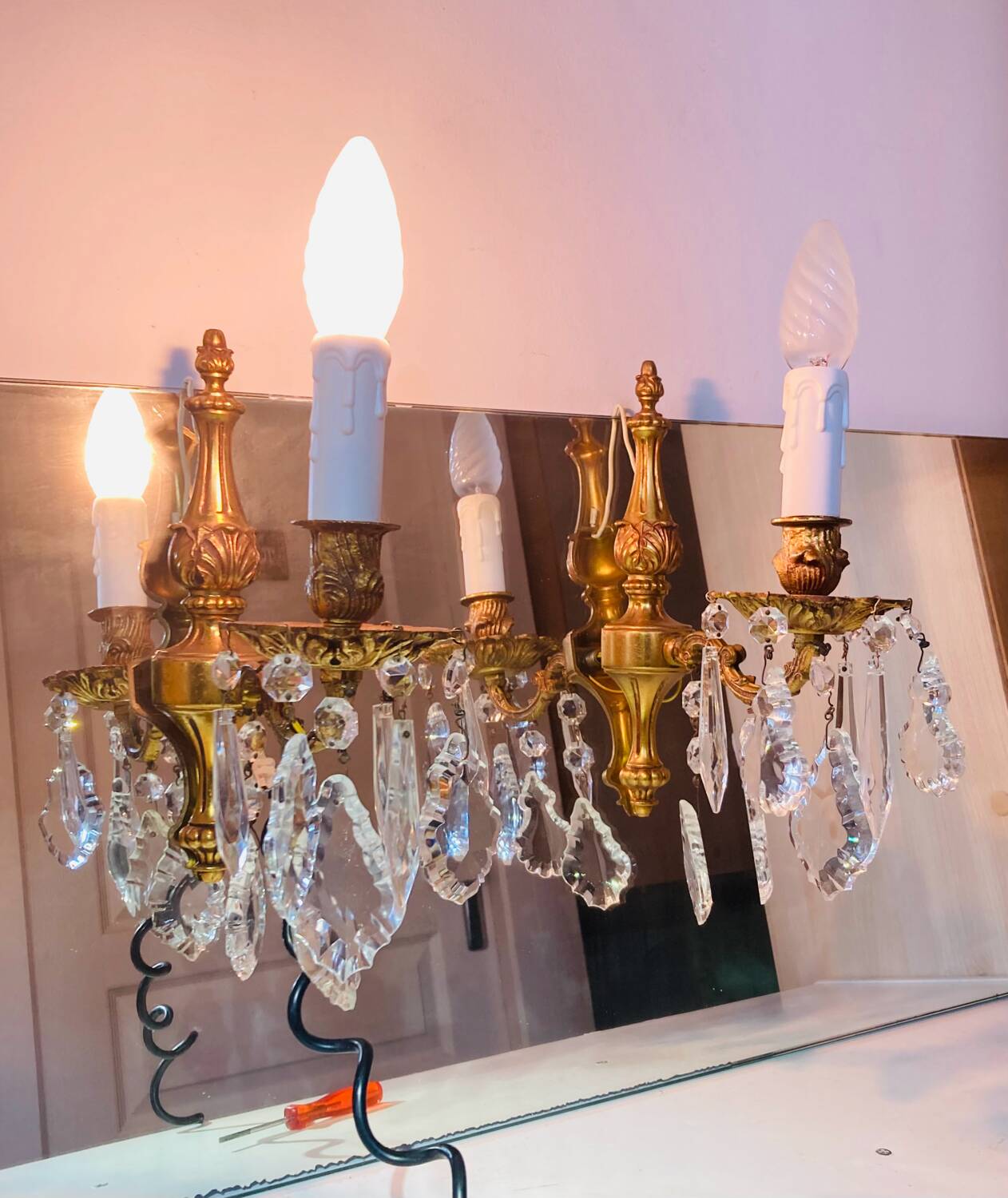 St Louis XV wall lights in gilded bronze with pendants from the mid-20th century.
