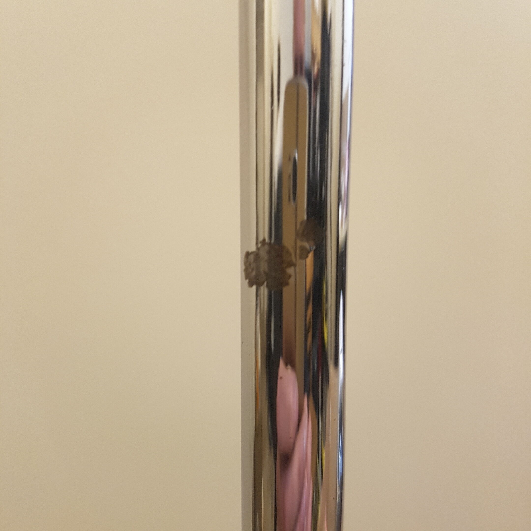 Two red lights and chrome floor lamp