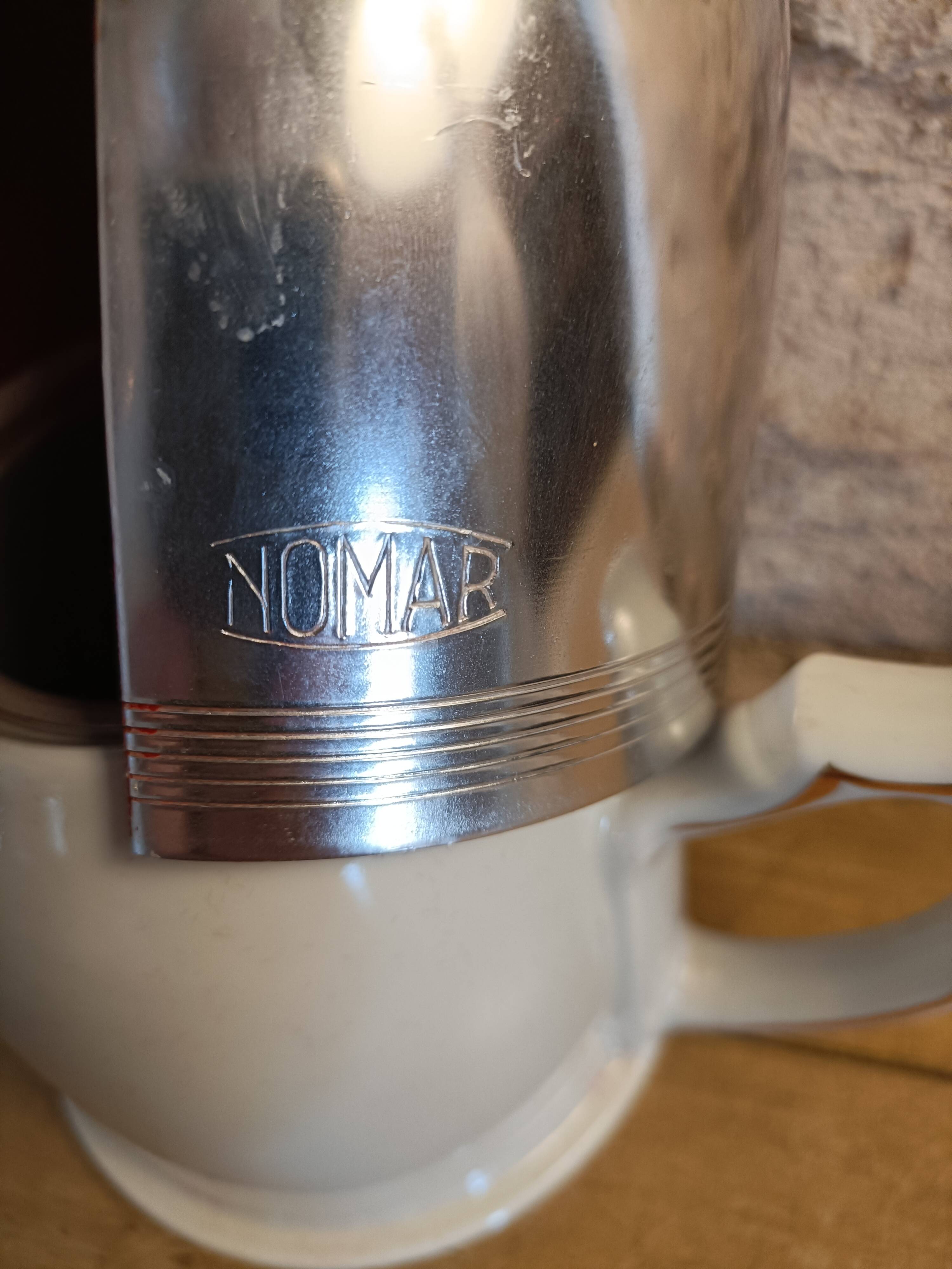 Nomar porcelain insulated teapot