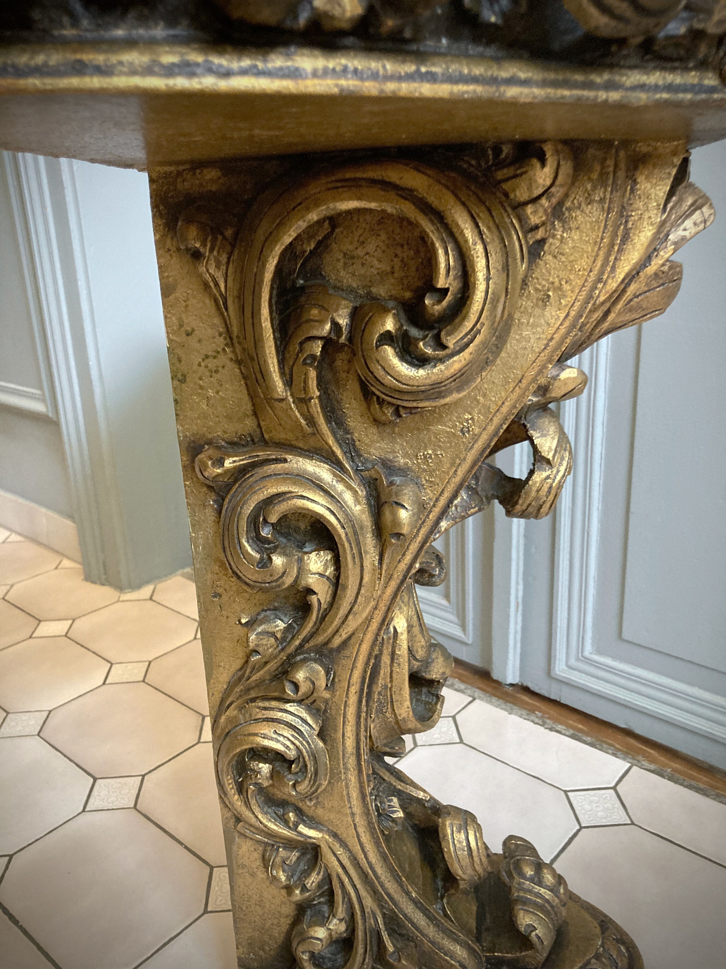 Carved wooden and marble console