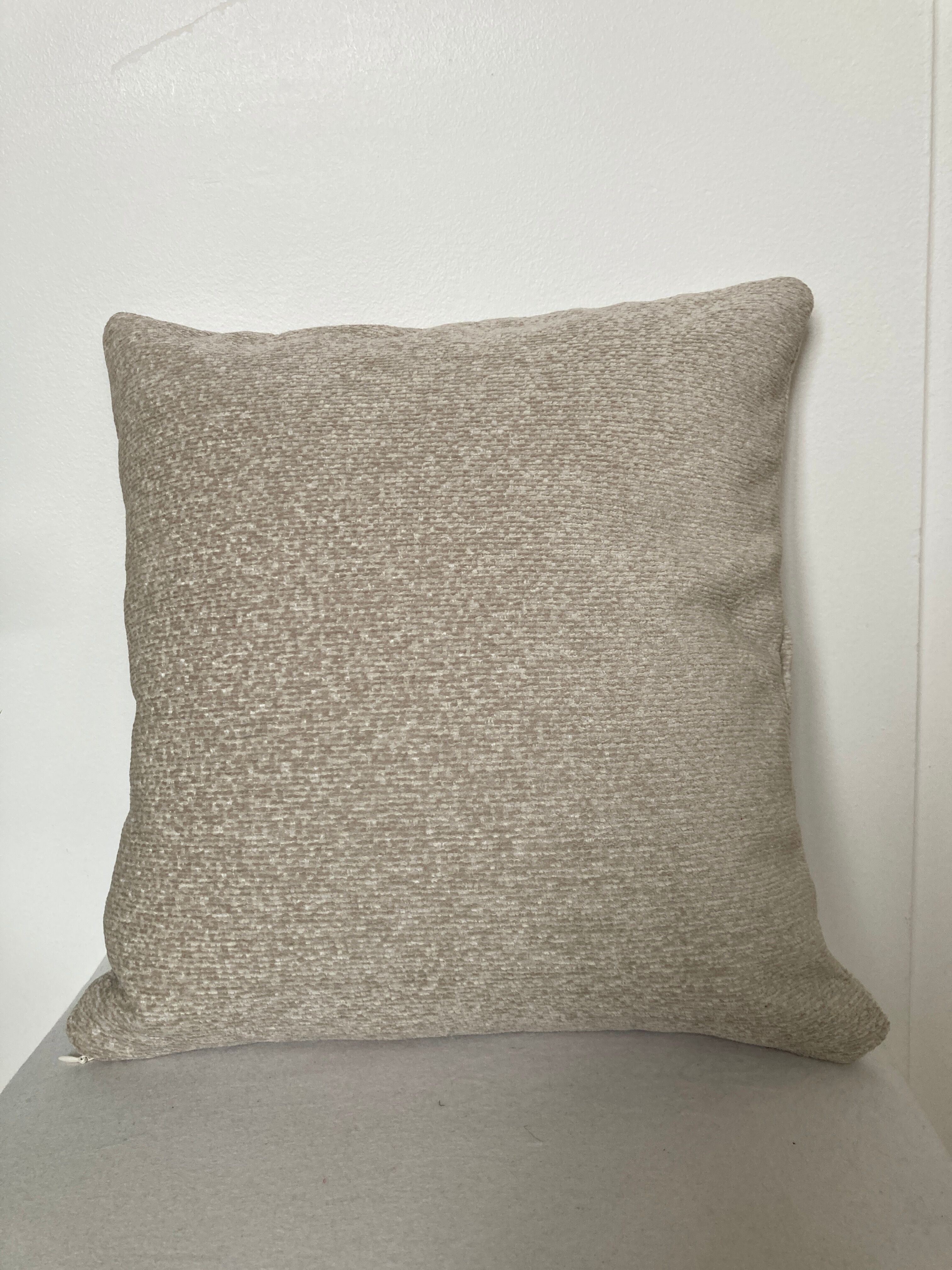 Off-white beige velvety effect cushion