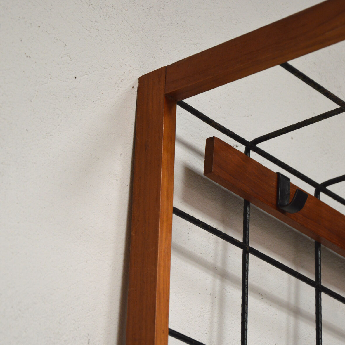 Iron and wood wall coat holders, 1960