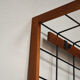 Iron and wood wall coat holders, 1960