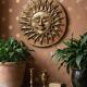 Anthropomorphic sun wall sculpture in patinated terracotta, vintage Italian craftsmanship.