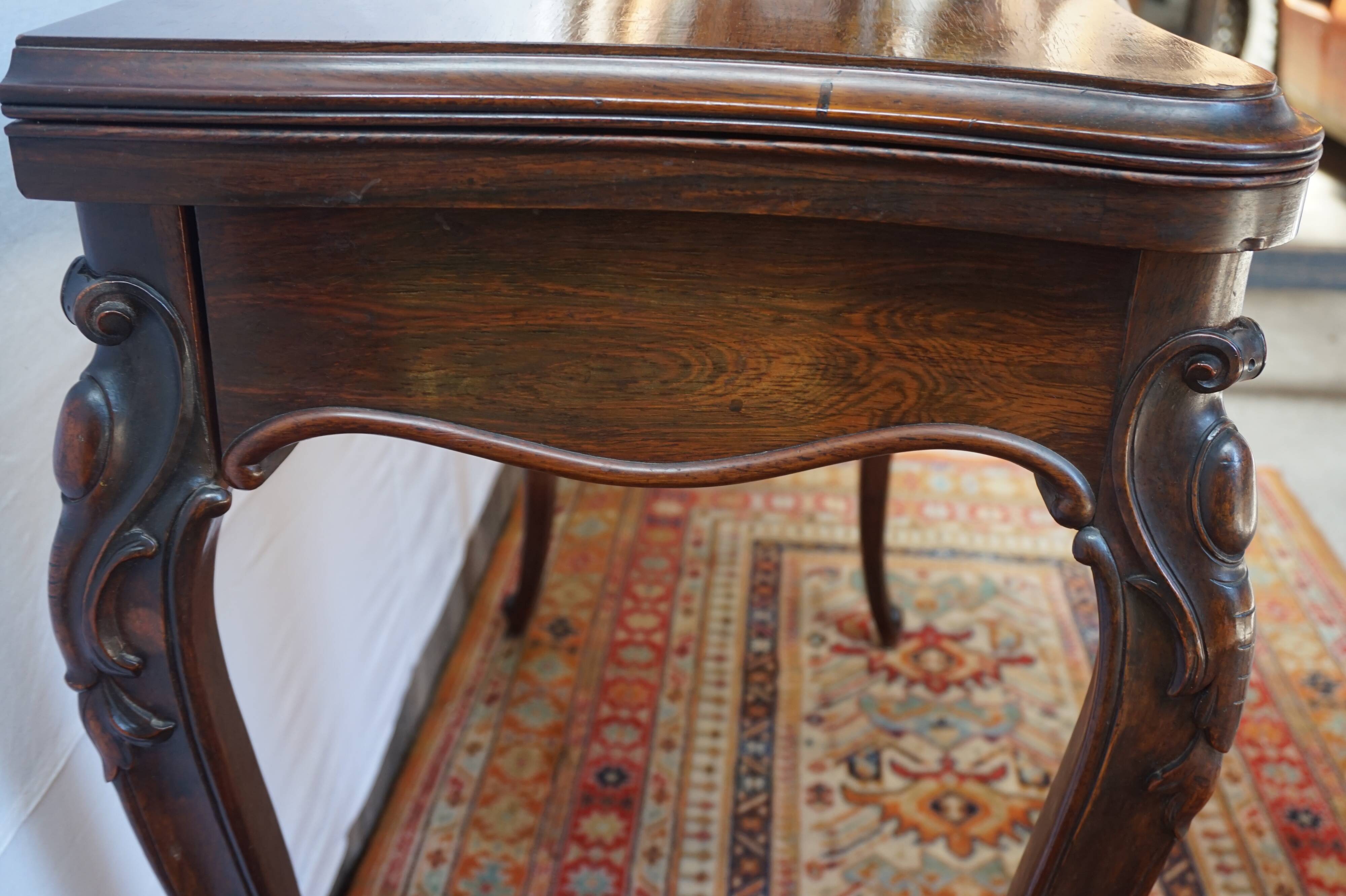 A XIX rosewood games table