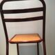 Chaise en bois et métal bordeaux